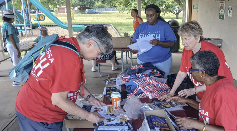 Dr. Vanessa Enoch meeting and working with volunteers
