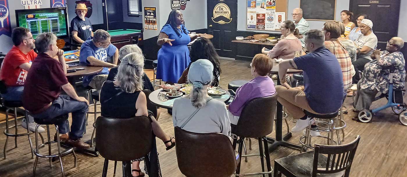 Dr. Vanessa Enoch speaking to supporters