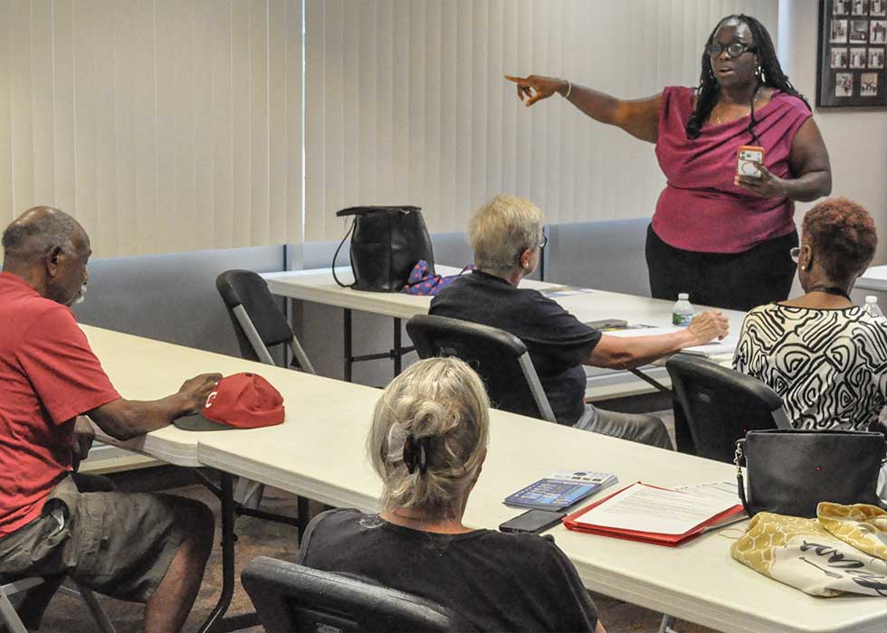 Dr. Vanessa Enoch speaking to a community group